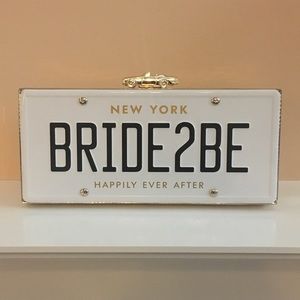 Used Kate Spade Bride2be license plate clutch